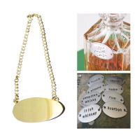 Gold finish decanter tags for labelling drinks decanters.