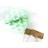 Assorted paper pom pom decorations in various colours