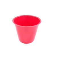 Small red plastic plant pot
