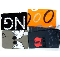 Assorted cooking aprons in various designs, clearance item.
