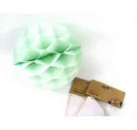 Assorted paper pom pom decorations in various colours
