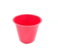 Small red plastic plant pot