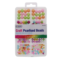 Assorted pearlised craft beads in various colours and sizes